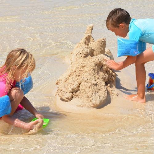 Kids Building Sand Castle